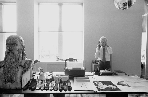 Warhol’s desk, Halston shoes, Leonardo da Vinci bust, 1981 (Photo by Robert Levin)