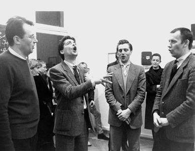 Opening of Martin Kippenberger and Albert Oehlen's show Women in My Father's Life in the Erhard Klein Gallery, Bonn, 1983. Featuring Max Hetzler, Werner Büttner, Albert Oehlen and Martin Kippenberger, singing the miner's song "Glück auf, Glück auf". © Galerie Klein.