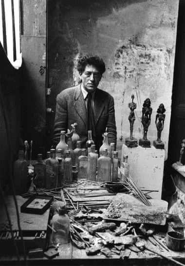 Alberto Giacometti in his studio, Paris, 1954.  Image: Sabine Weiss. © The Estate of Alberto Giacometti (Fondation Giacometti, Paris and ADAGP, Paris), licensed in the UK by ACS and DACS, London 2021.