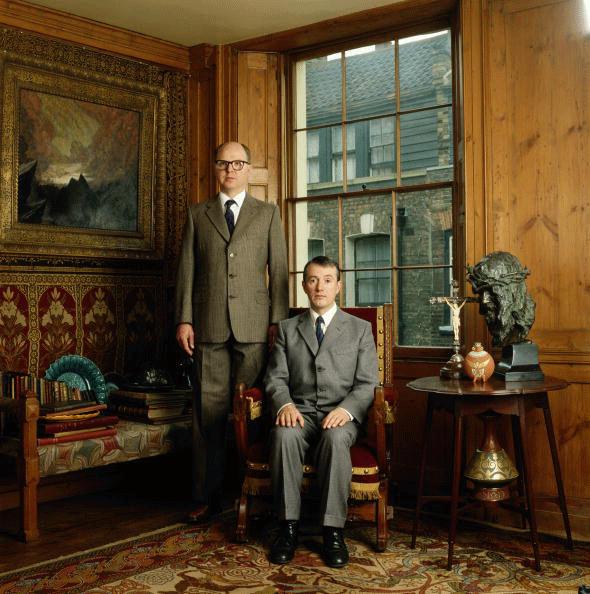 Gilbert and George at their home in Fournier Street, Spitalfields, East London, circa 1990. Image: David Montgomery/Getty Images.