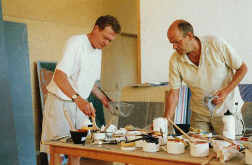 Gunther Forg in his studio with friend. 