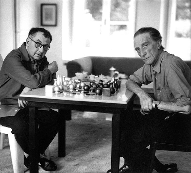 Man Ray and Marcel Duchamp playing chess, c. 1957. © Michel Sima / Bridgeman Images